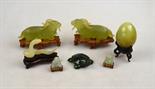 A Chinese green hardstone carved snake, 7 cm long x 3.8 cm high, an egg, 5.5 cm and two miniature