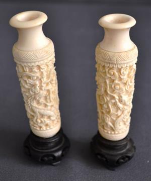A Pair Of Chinese Carved Ivory Vases Carved With Kylin In Foliage