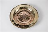 An Alms Dish, Nuremberg, gilt copper, relief and engraved decoration "Joshua and Caleb carrying a
