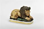 A Toothpick Holder "Lion lying with pedestal", Vista Alegre porcelain, polychrome and gold