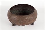 BURMESE BRONZE PLANTER with embossed decoration of figures and mythical creatures, 23.5cm diameter