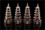 FOUR CHINESE SILVER PAGODA SHAPED PEPPERS each 8cm high