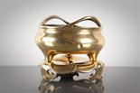 CHINESE BRONZE CENSER mark to base, 12cm wide, on lotus shaped stand, 9cm high overall