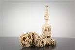 CHINESE IVORY CONCENTRIC BALL ON STAND the stand with dragon decoration, 18.5cm high; along with two