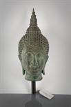 THAI BRONZE BUDDHA HEAD SCULPTURE modelled with pointed headdress and long earlobes, 33cm high