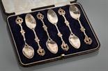 VICTORIAN SET OF SIX SILVER COFFEE SPOONS with pierced shell terminals, London 1896, import marks,