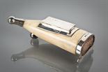 EDWARDIAN SILVER MOUNTED WHALE`S TOOTH TABLE VESTA BOX with small silver lidded compartment, the end