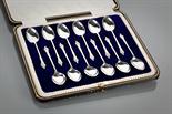 SET OF TWELVE GEORGE V SILVER TEASPOONS with apostle terminals, Sheffield 1911, approximately