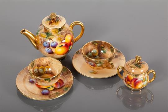 ROYAL WORCESTER MINIATURE TEA SET comprising a teapot, sugar, bowl ... ROYAL WORCESTER MINIATURE TEA SET comprising a teapot, sugar, bowl ...