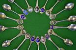 18 x various Tennis silver plated and enamel tea spoons – to incl lone silver hallmarked – all
