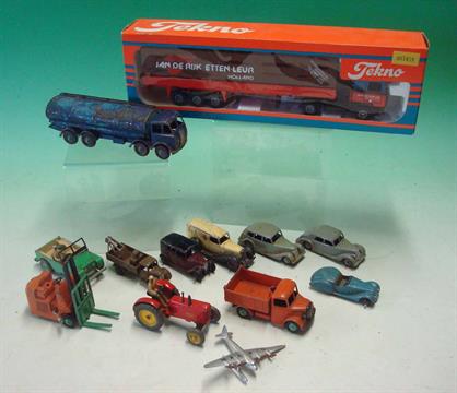 Selection of Dinky Vehicles: To include early examples Triumph, Riley, Crane Truck, Taxi, Ambulance,