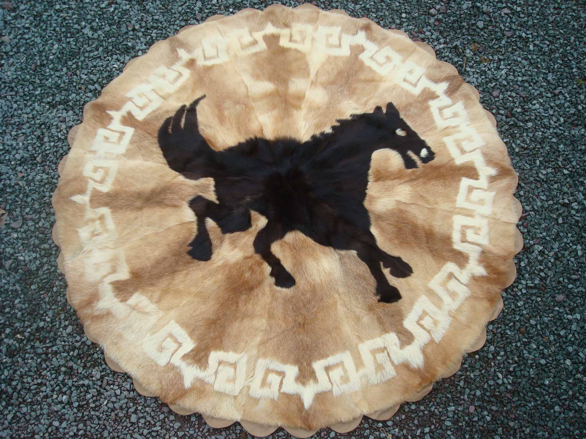 Vintage Deer Skin Circular Rug: Having a black horse design to centre with a Greek Key design to the