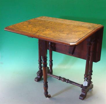 A 19th century Burr Walnut Sutherland Table: Elegant form and raised on cabriole shaped legs. This