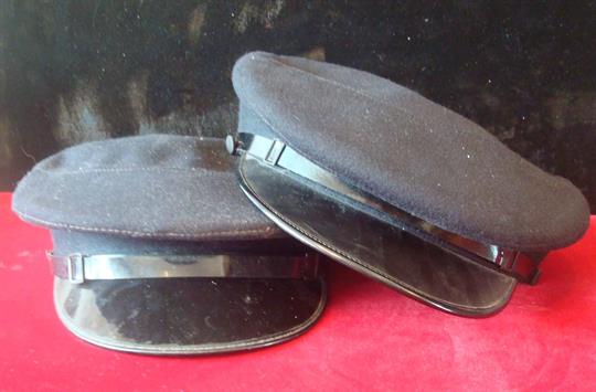Two1950s Woman`s Police Force Caps: Both having high top design with Black patent peak and un-badged
