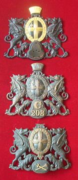 City of London Police Helmet Plates: Early example with C208 to front missing 1 lug, later example
