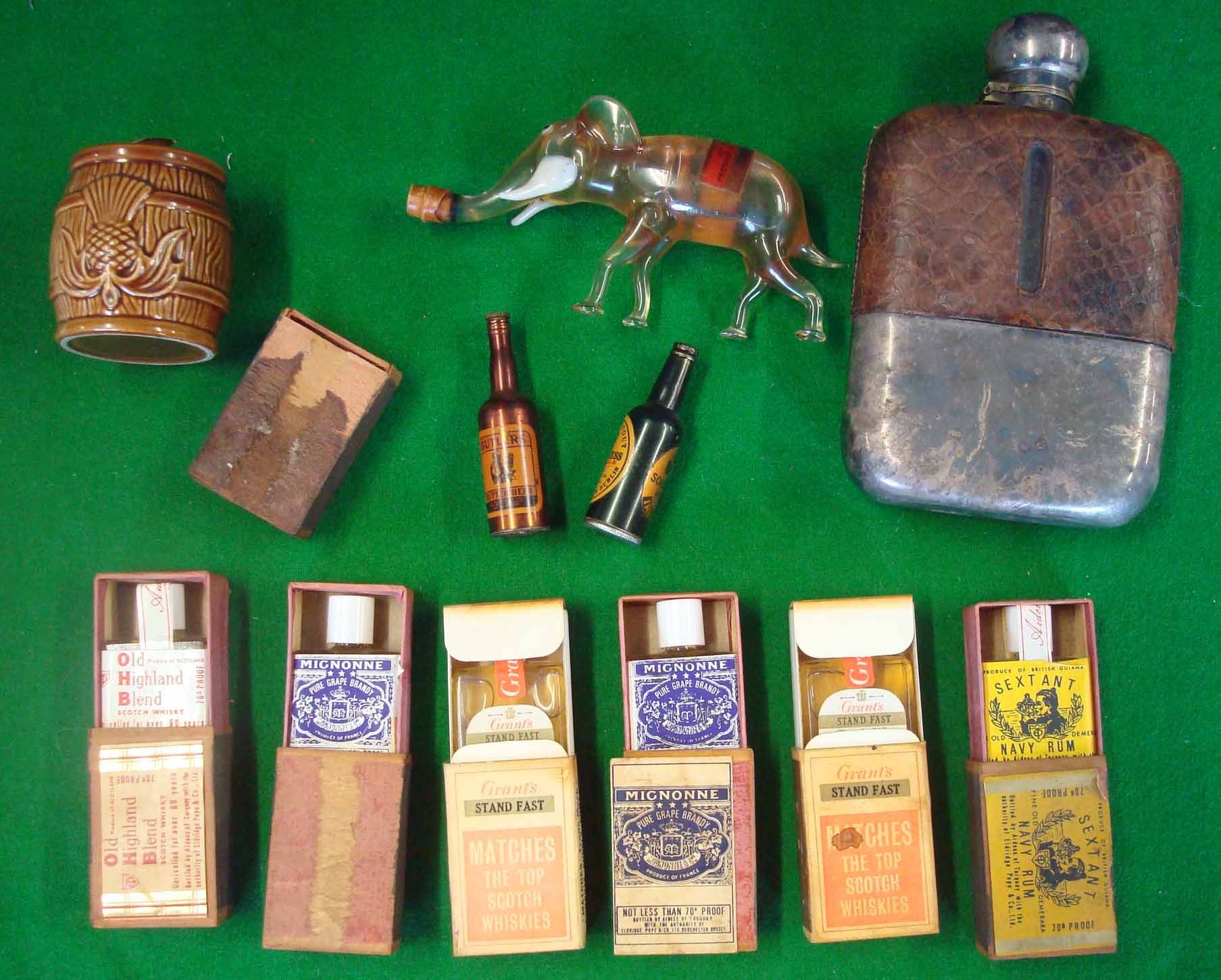 Collection of various Miniature Alcohol Bottles: To include; glass elephant shaped bottle, Peter