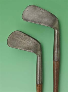 2x early Tom Stewart made deep smf mashies c1890s – both with the early pipe mark, one stamped