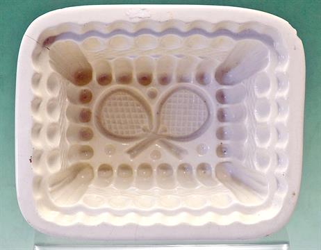 Scarce Copeland white china ironstone tennis jelly mould c1900 – the inside decorated with crossed