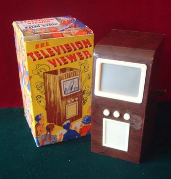 S.E.L. Television Viewer: British, 1950s, brown hard plastic in the form of a television set,