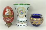 A Continental green and white glass overlay vase overpainted with flowers, 15cm high, a red glass