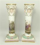 A pair of Meissen porcelain candlesticks, late 19th century, of columnar form with Ionic capitals
