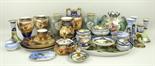 A collection of Noritake porcelain decorated with desert landscapes, rural landscapes or flowers,