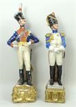 A pair of Capodimonte porcelain figures of Napoleonic soldier, by B Merli, one of a British