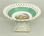 A porcelain pedestal comport, possibly Ridgway, early 19th century, painted with a Norman keep in