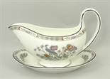 A Wedgwood porcelain part dinner service decorated in the 'Kutani Crane' pattern, comprising meat
