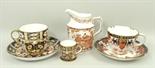 A Royal Crown Derby porcelain cream jug decorated in the 'Red Aves' pattern, a miniature Royal Crown
