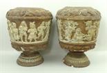 A pair of Continental earthenware vases, possibly oil lamp bases, late 19th century, moulded with