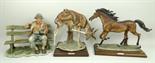 A Capodimonte figure, modelled by G Armani, of a galloping brown horse, raised on a wooden base,