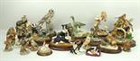 A collection of Border Fine Arts sculptures, comprising 'Evening Shadows' SOC7, one with badgers and