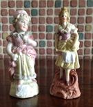 Two small bisque figures 9cms.