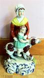 Early Staffordshire figure, child on a dog a/f.