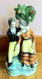 Early Staffordshire figure, a couple with bocage, a/f.