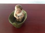 German porcelain figure, boy in a bath.