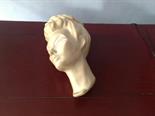 Art Deco wall pocket, a ladies head.