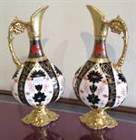 Pair Crown Derby ewers 26cms high.