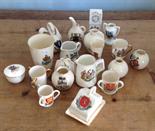 Nineteen items of crested ware.