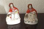 Two Red Riding Hood figures, late 19thc staffordshire, firing cracks.