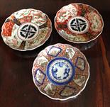 Three late 19thc Japanese Imari plates, 21cms. ceramics.