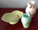 Royal Worcester reproduction mask jug, Carlton ware bowl and green glass vase.