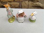 Three Beswick Beatrix potter figures, Foxy Whiskered Gentleman, Mrs Tiggywinkle and Rebecca