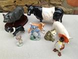 Nine pottery figures including Beswick penguin a/f.