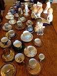 Large quantity of pottery and porcelain including Kingston pottery figure, coffee cans etc.