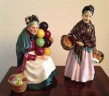 Two Royal Doulton figures, The orange Lady HN1759 and The Old Balloon Seller HN1315.