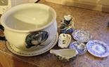 An assortment of 19th century pottery to include potty, plate warmer and miniature Worcester plate.