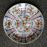 Eighteenth century polychrome Delft plate 24cms diameter.