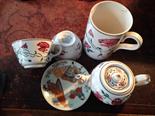 Four pieces of Villeroy and Boch and a Japanese satsuma saucer.